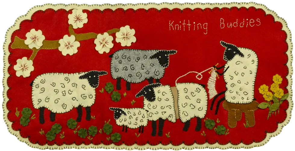 Knitting sheep needlepoint wall hanging.