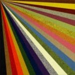 Here's an alt tag for the image: `Colorful radiating stripes of textured paper`